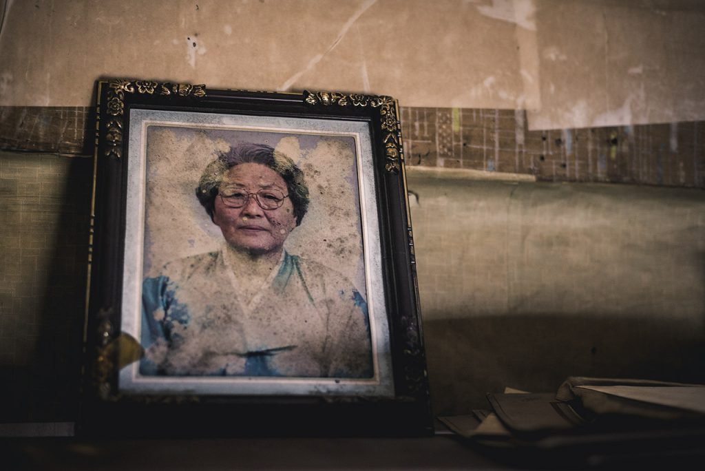 A dusty portrait of an old lady