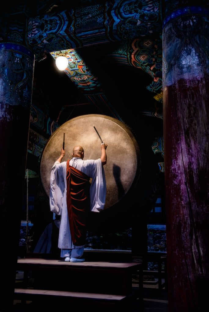 Monk plays drums at Haeinsa temple