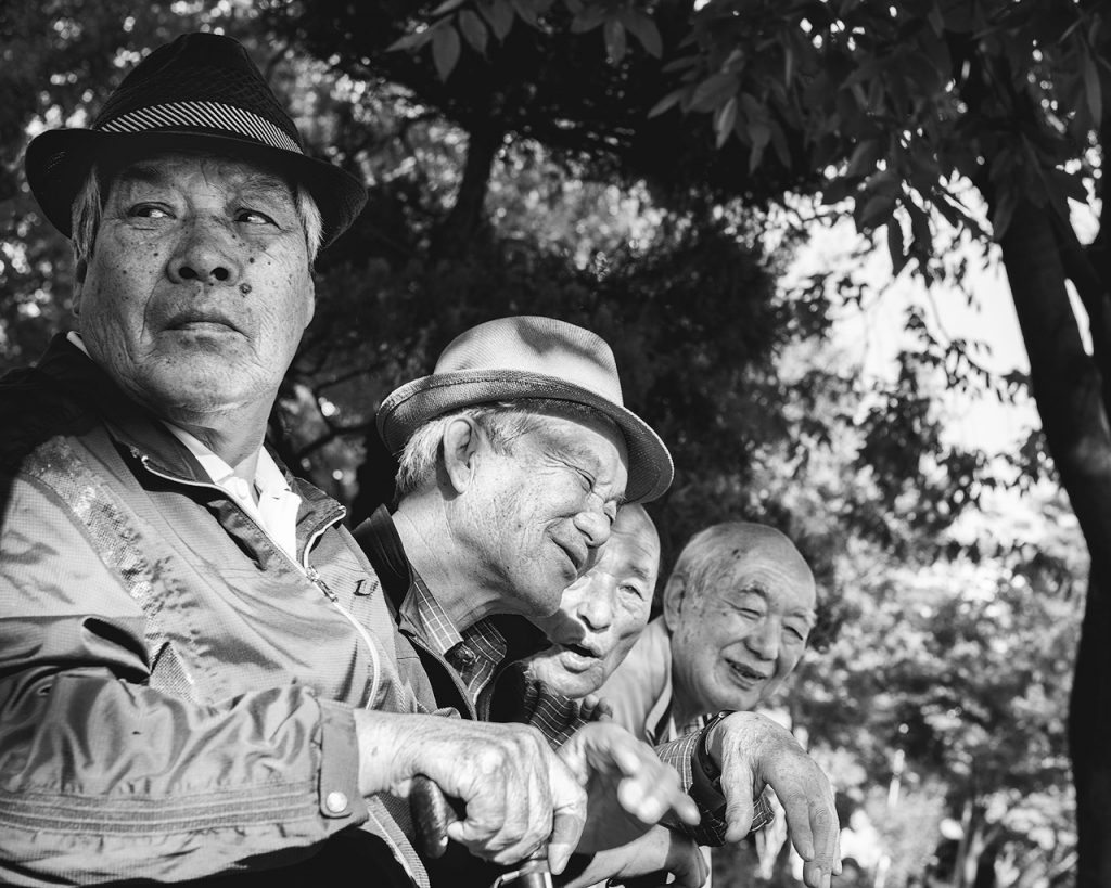 Old men sit together in Gwangju, South Korea