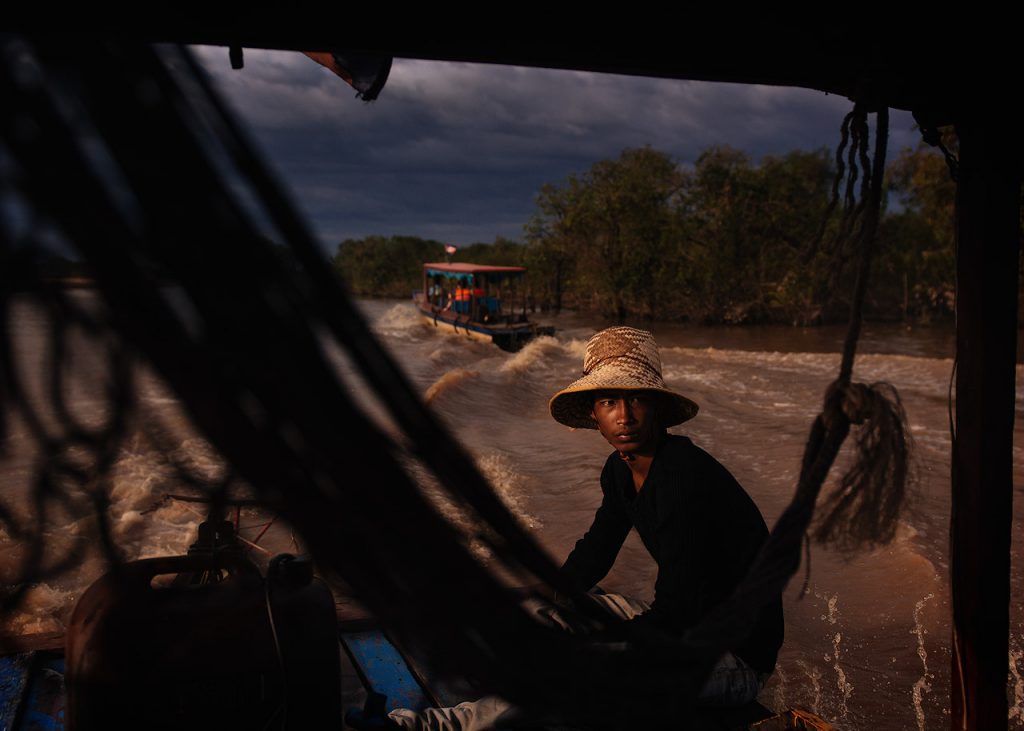 Khmer boatman heading out to the Tonle Sap Lake